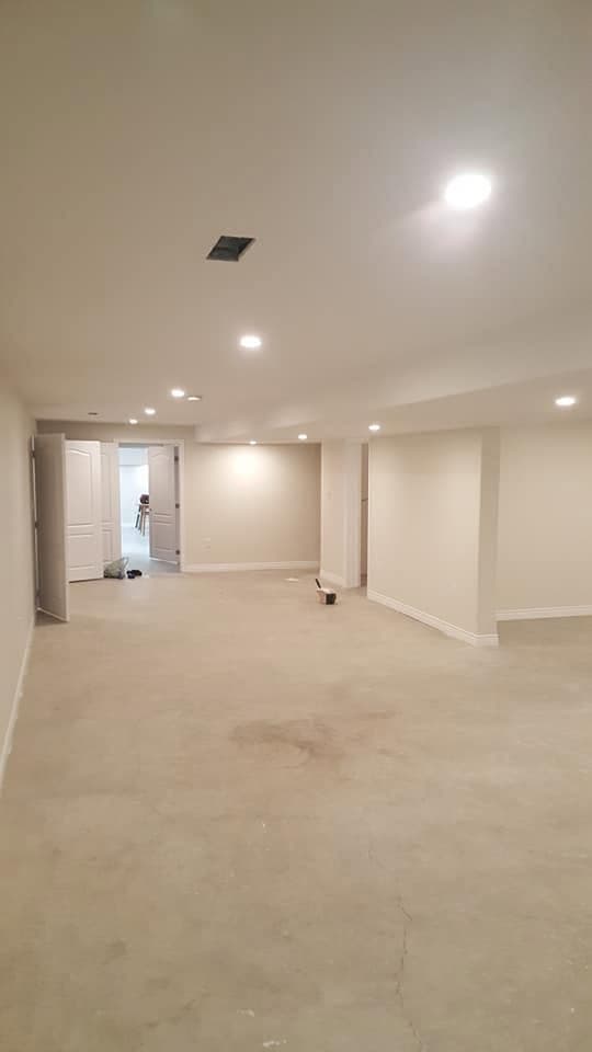 Bright finished basement painting job