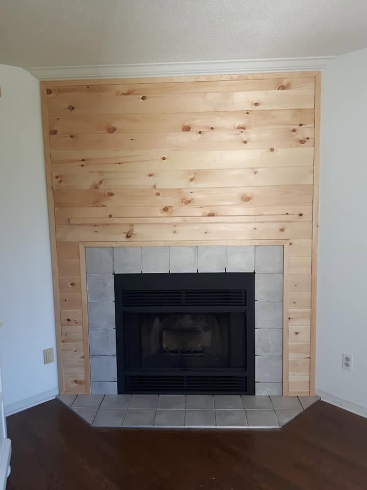 Refinished fireplace and mantel with a fresh coat